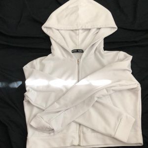 White zip up jacket